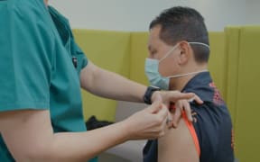 Jet Park operations manager Drew Leafa getting his second Pfizer Covid-19 vaccine.