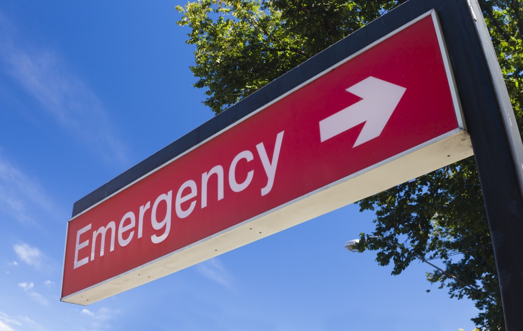 Sign outside the emergency room of a hospital