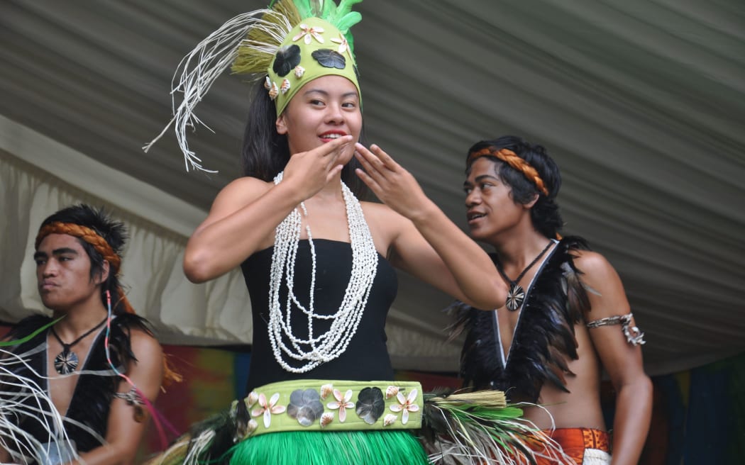 A traditional Cook Island dance group entertains a large crowd at the Pasifika Festival in Auckland in 2012.