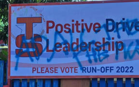 A defaced Torres election billboard