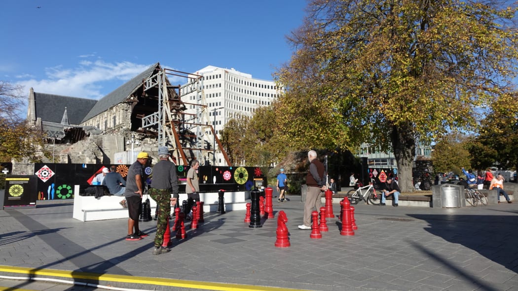 Christchurch's Cathedral Square is again busy with people enjoying a sunny Sunday afternoon, but five years on the cathedral still waits in disrepair.