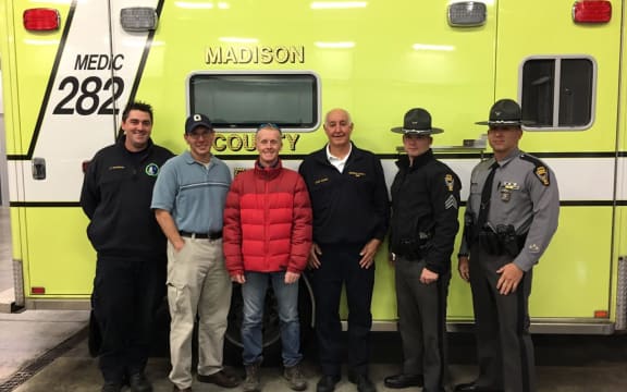 Kiwi runner Nick Ashill is reunited with state troopers and emergency service members the year he was struck by a ute in Ohio.