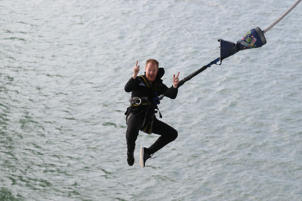 Mike Heard during a bungy jump from the Auckland Harbour Bridge.