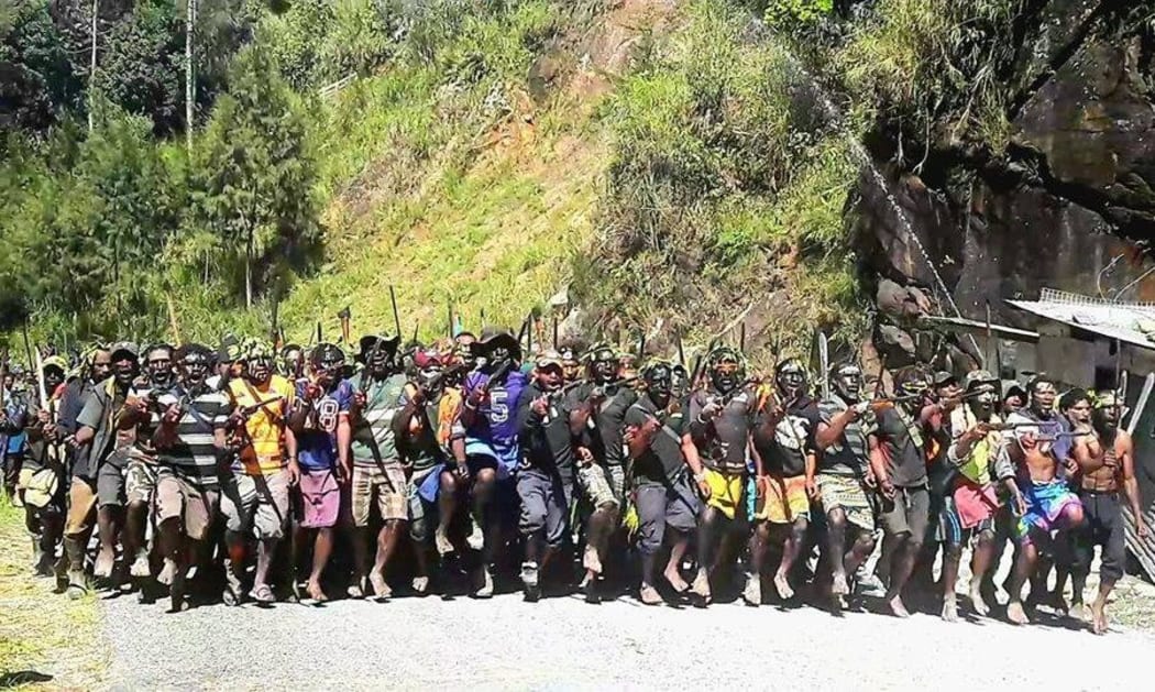 Warring tribesmen gather for the signing of the ceasefire agreement.