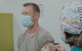 Managed Isolation and Quarantine (MIQ) head Brigadier Jim Bliss getting his second vaccine.