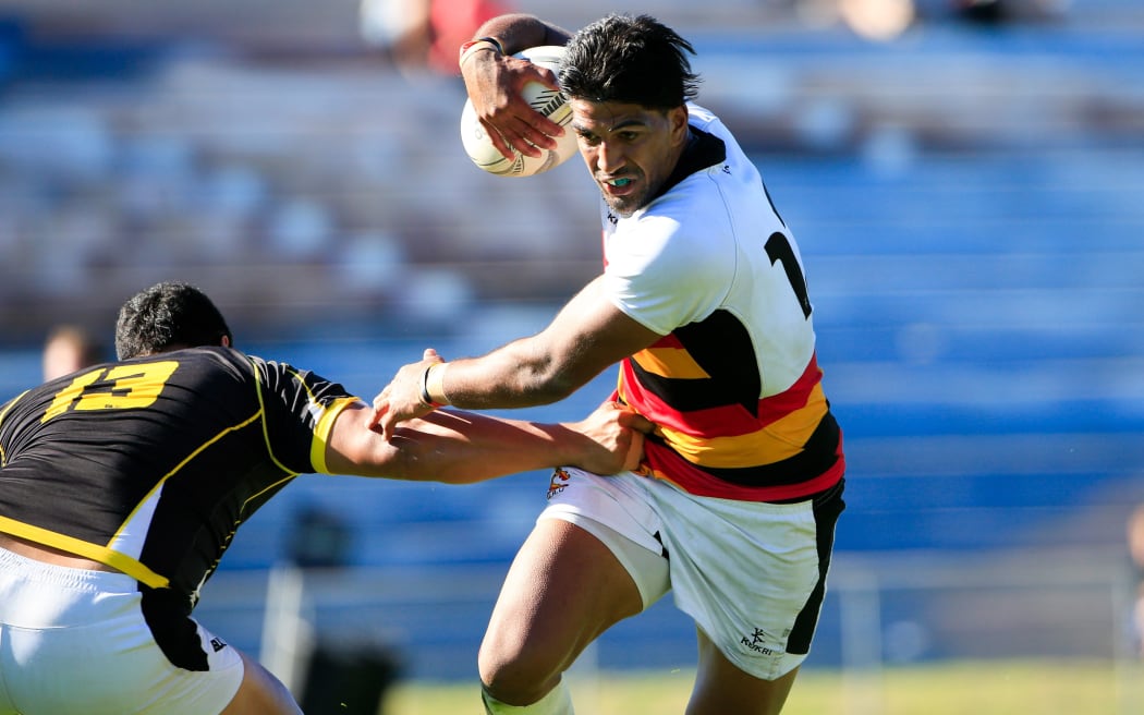 Waikato's Dylan Collier breaks a tackle.
