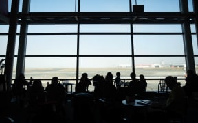 Low fog delays and cancels flights at Wellington Airport Tues 21st Jan 2020.  View of fog through Wellington Aiport windows.