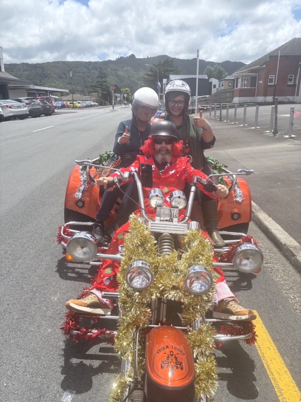 Bretto from Trikn Tours taking Vicki Waiwai and another friend for a tour around Upper Hutt.