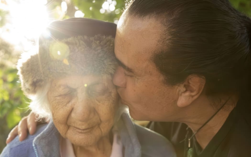 Isey Cross, who died on Sunday aged 106, with her son and caregiver James Cross.