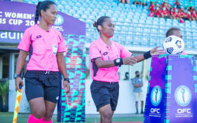 Maria Salamasina on the left as a referee assistant for OFC