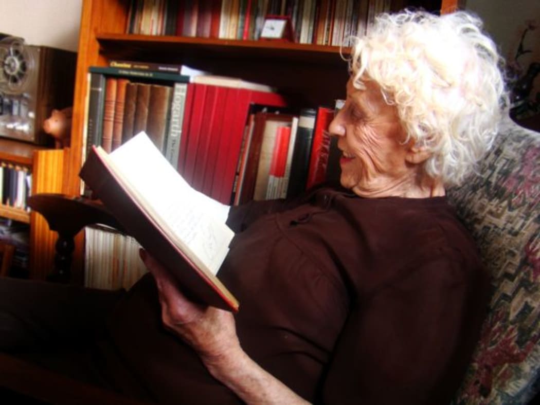 Elderly lady reading