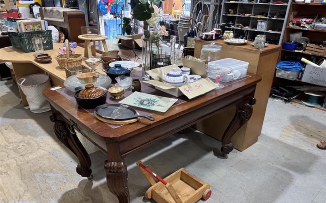 Furniture from the Wellington Town Hall for sale at the local tip shop.