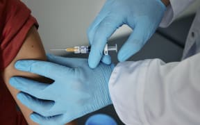 Childhood vaccination. (Photo by PEAKSTOCK / SCIENCE PHOTO LIBRAR / LDA / Science Photo Library via AFP)