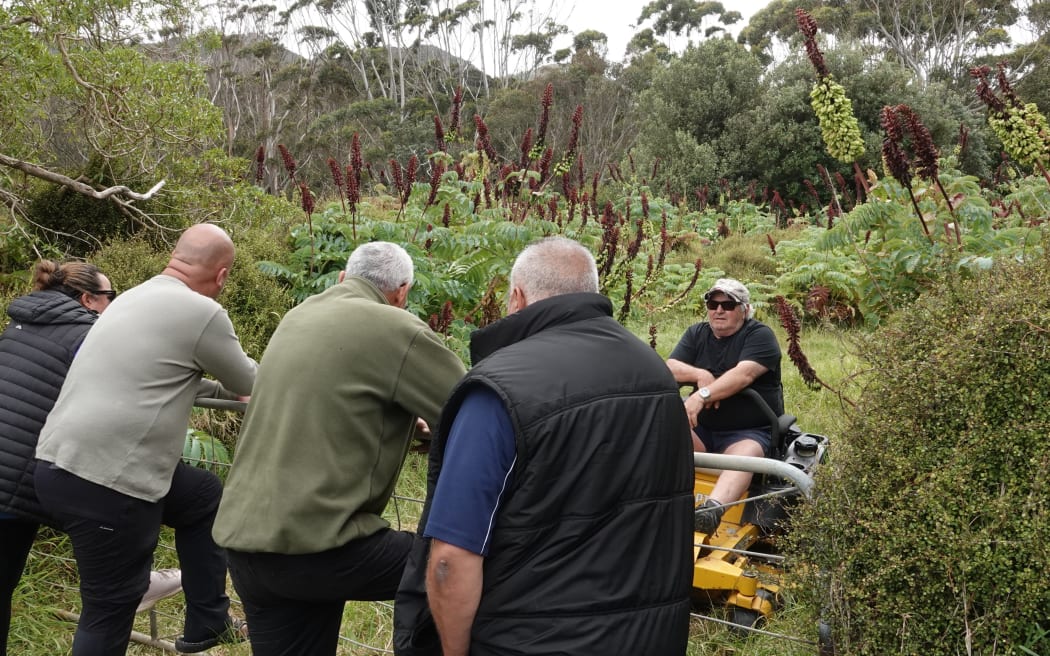 Landowner Peter Hay, right, talks to kaumātua as the occupation gets underway.