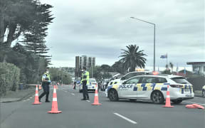 Police at the scene in New Lynn, Auckland where a homicide investigation was launched after a person died on Friday morning.