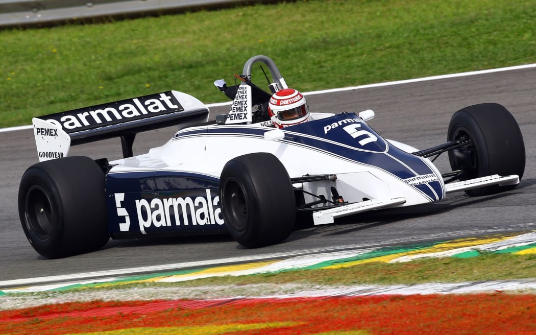 The Brazilian motor racing driver Nelson Piquet takes his 1981 championship winning Brabham BT49C on a demonstration lap at the 2011 Brazilian Grand Prix.