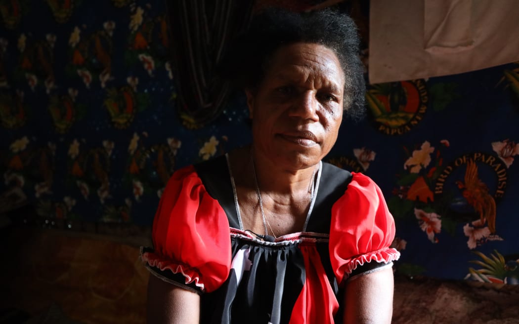 Evelyn Kunda looks at the camera