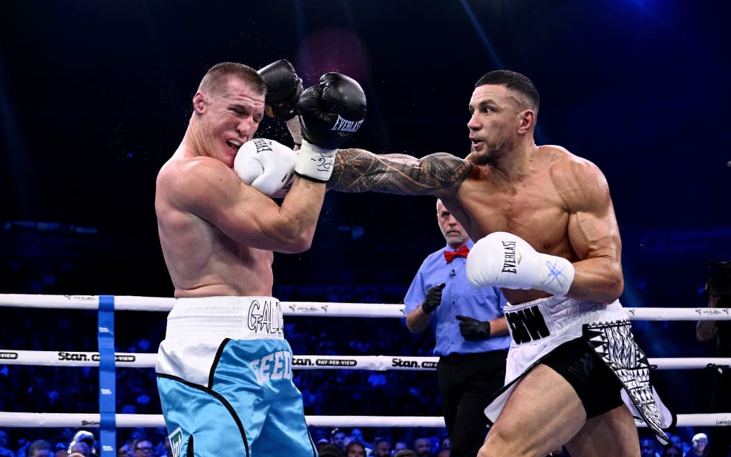 Sonny Bill Williams, right, lands a blow on Paul Gallen during their boxing bout in Sydney, July 16, 2025. (AAP Image/Dan Himbrechts / Photosport) NO ARCHIVING, EDITORIAL USE ONLY