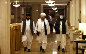 Leaders of the Taliban movement walk to attend a press conference in Moscow on 9 July 2021. - Russia on July 9, 2021, said the Taliban controls about two-thirds of the Afghan-Tajik border and urged all sides in Afghanistan to show restraint.