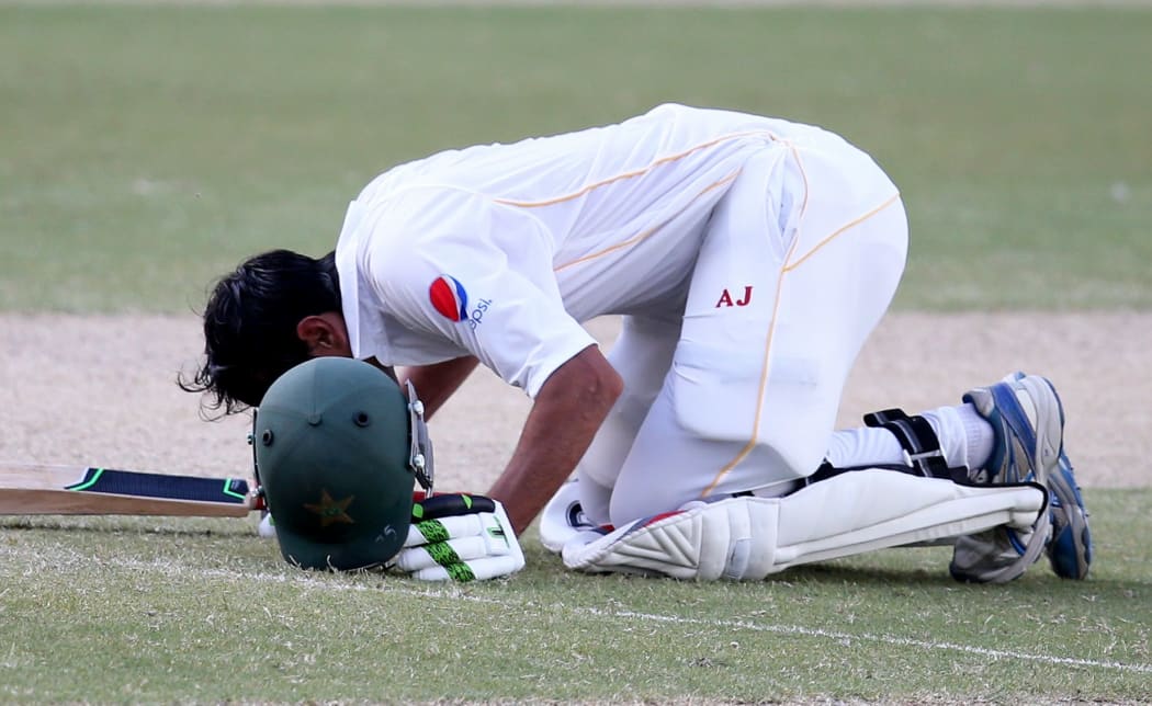 Pakistan's Younis Khan kisses the ground during the second cricket test against England.