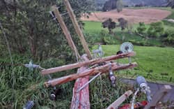 A downed power pole and lines