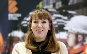 Britain's Deputy Prime Minister Angela Rayner reacts as she meets with members of staff during her visit to British Steel's site in Scunthorpe, northern England on April 14, 2025. Britain's government on Monday raced to secure raw materials to keep the country's last steelmaking blast furnaces running, as Beijing warned the UK against politicising the takeover of Chinese-owned British Steel. (Photo by Peter Byrne / POOL / AFP)