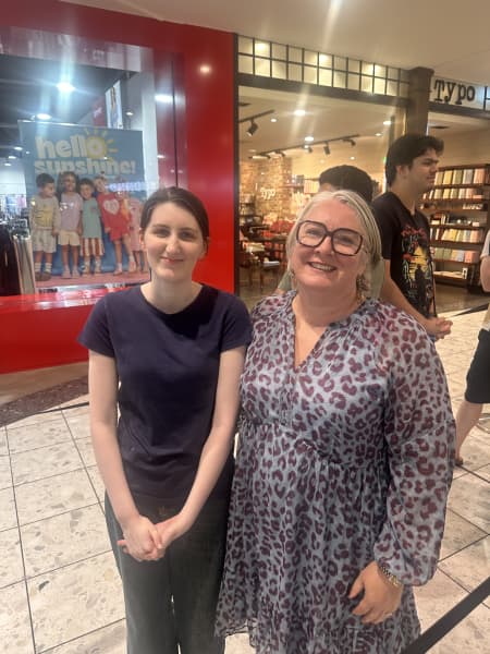 Klaris and her daughter Paige at EB Games in St Lukes, Auckland.