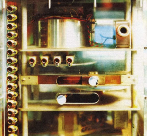 A close view of a 'Crystal Palace', showing the capacitance 'multiplexer drum' at the top, above the motor control levers and 'gearing'.