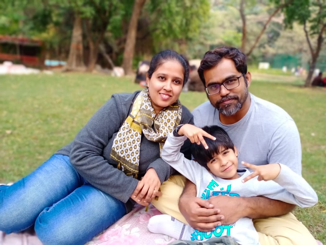 Masthan Pathana, right, with wife Afza and their son Affu, now 7 years old.