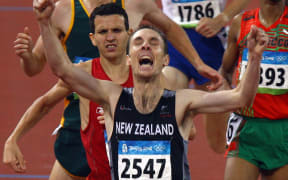 Nick Willis crosses the line third at the Beijing Olympics.