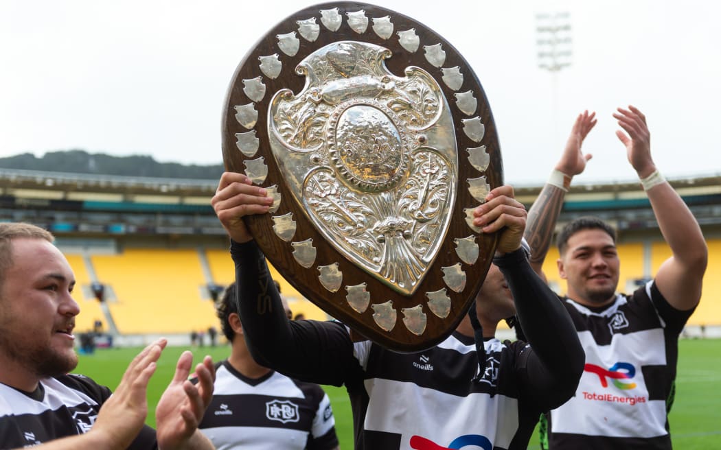 Jonah Lowe of Hawke's Bay holds the Ranfurly Shield.