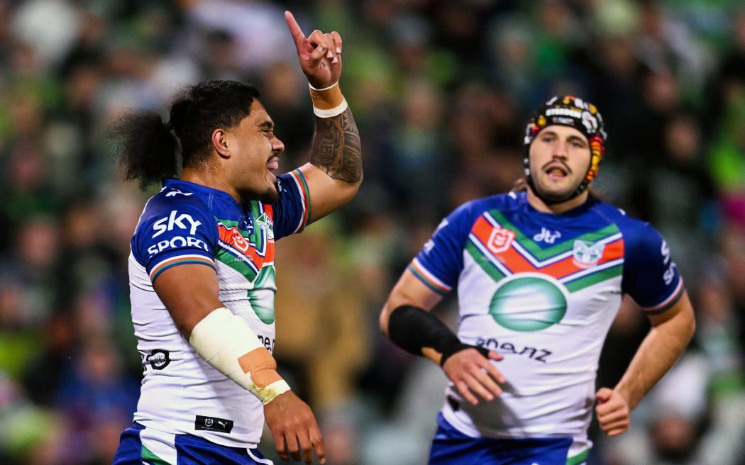 Tom Ale of the Warriors celebrates after scoring a try