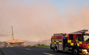 Smoke seen near the fire at a scrap yard in Papakura.