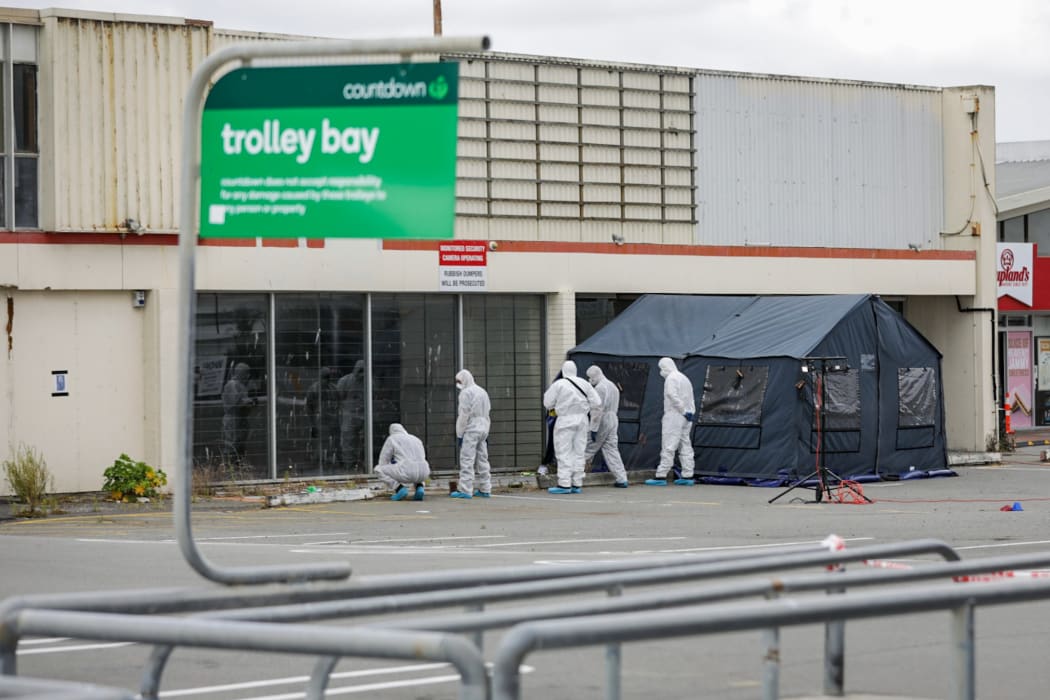 A homicide investigation is underway after a woman was killed near a supermarket carpark in New Brighton.