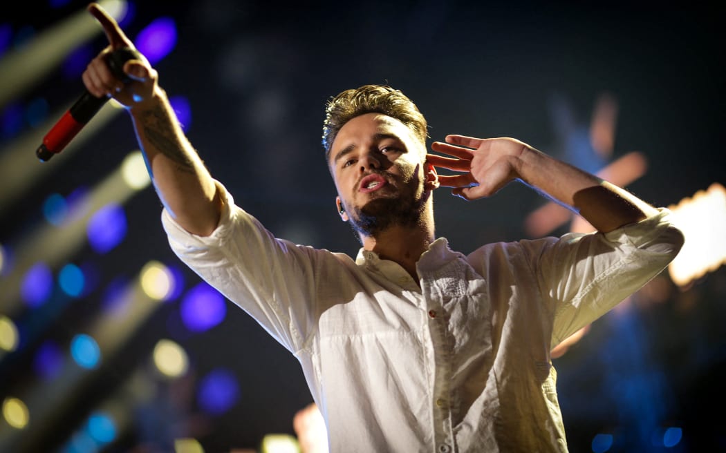 LOS ANGELES, CA - DECEMBER 04: Recording artist Liam Payne of music group One Direction performs onstage during 102.7 KIIS FM?s Jingle Ball 2015 Presented by Capital One at STAPLES CENTER on December 4, 2015 in Los Angeles, California.   Christopher Polk/Getty Images for iHeartMedia/AFP (Photo by Christopher Polk / GETTY IMAGES NORTH AMERICA / Getty Images via AFP)