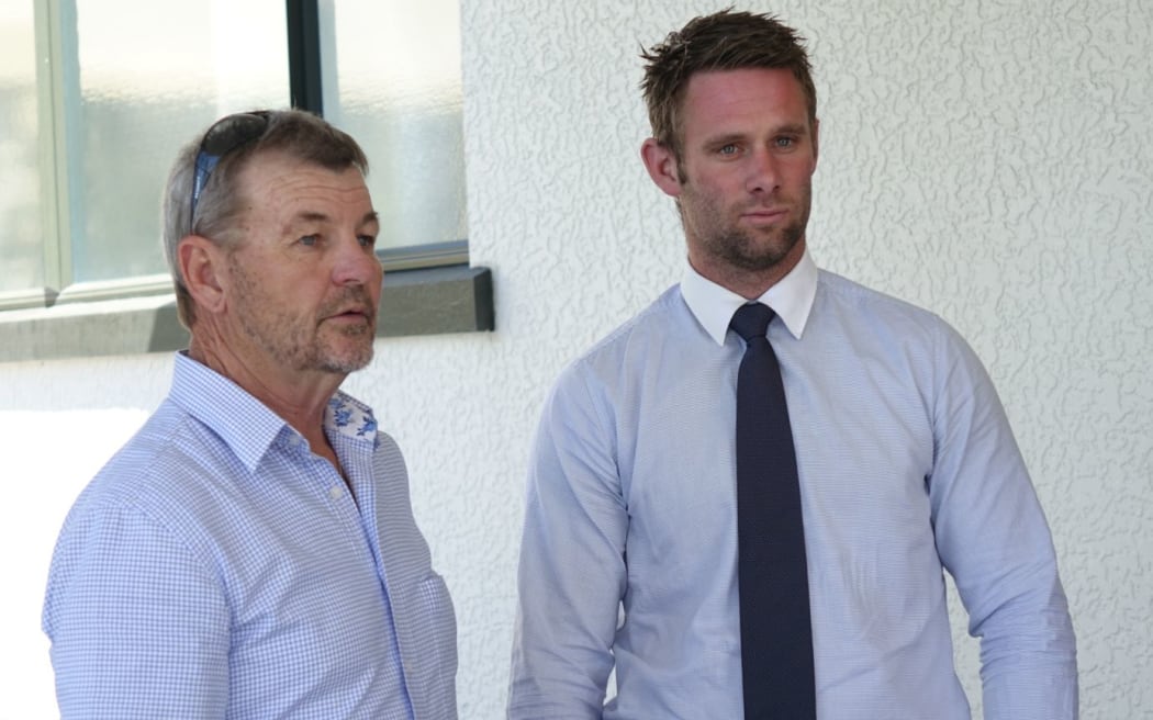 Dave Armstrong, left, with Scott Lee, the hunter he rescued, outside court today.