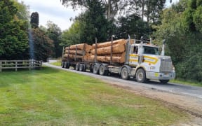 A big logging truck on Tarata Road in Taranaki.