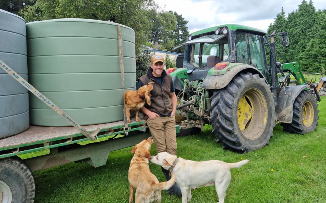 Tom Lane, a sheep and beef farmer near Waiwhare, went to neighbours to fill tanks with fresh water after his pump station was knocked out of action in the cyclone.