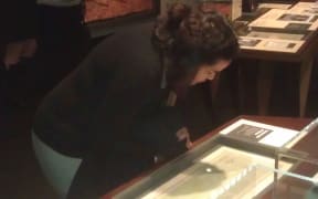 woman looking at exhibition