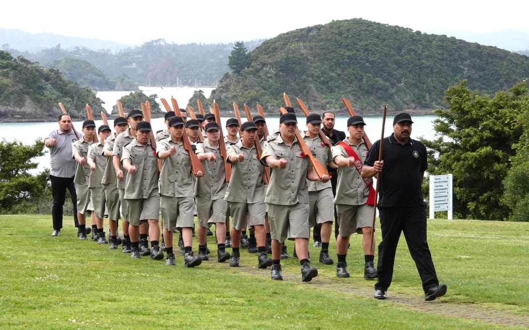 Students of the Whangārei-based Leadership Academy of A Company march across the Treaty Grounds, retracing the steps of the 28th Māori Battalion in 1940.