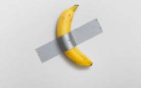 Maurizio Cattelan’s Comedian is comprised of a banana fastened to a wall with duct tape, hung exactly 160 centimeters from the floor.