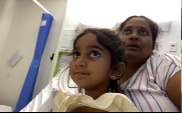 Priya and four year old Tharnicaa in hospital