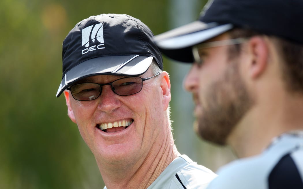 John Bracewell laughs with captain Daniel Vettori (R) ahead of the first test against Australia in Brisbane in 2008.