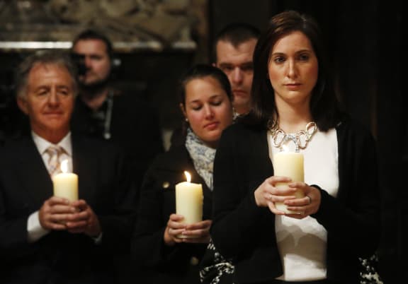 Jennifer Evans, right, a niece of one of the bombing victims, at the Westminster Abbey service.