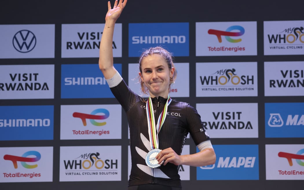 Silver medallist New Zealand rider Niamh Fisher-Black celebrates on the podium following the women's Elite road race cycling event during the UCI 2025 Road World Championships, in Rwanda, 2025.