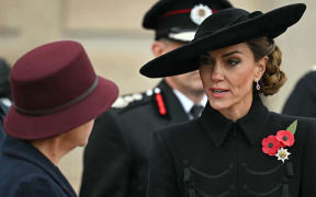 Britain's Catherine, Princess of Wales attends an Armistice Day service at The National Memorial Arboretum at Alrewas, central England on November 11, 2025. Armistice Day, November 11, is the anniversary of the end of the First World War and services across Commonwealth countries remember servicemen and women who have fallen in the line of duty since WWI. (Photo by Paul ELLIS / AFP)