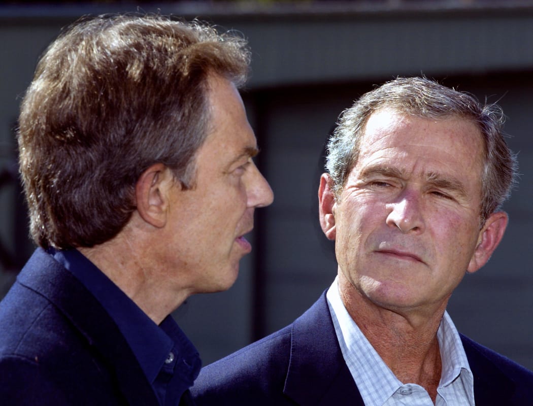 Former US President George W. Bush and former British Prime Minister Tony Blair in 2002.