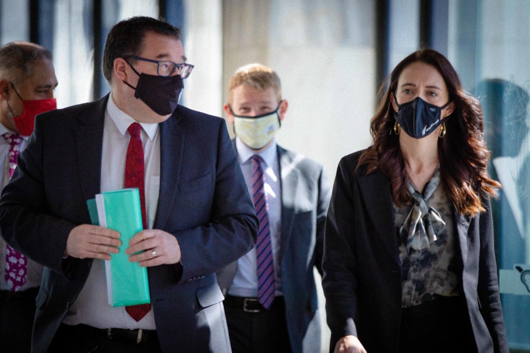 Jacinda Ardern and Grant Robertson arriving the Traffic Light System announcement