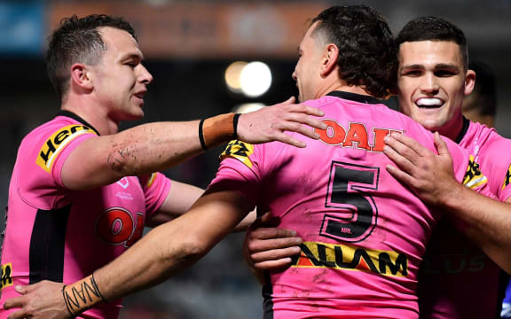 Penrith players celebrate a try.