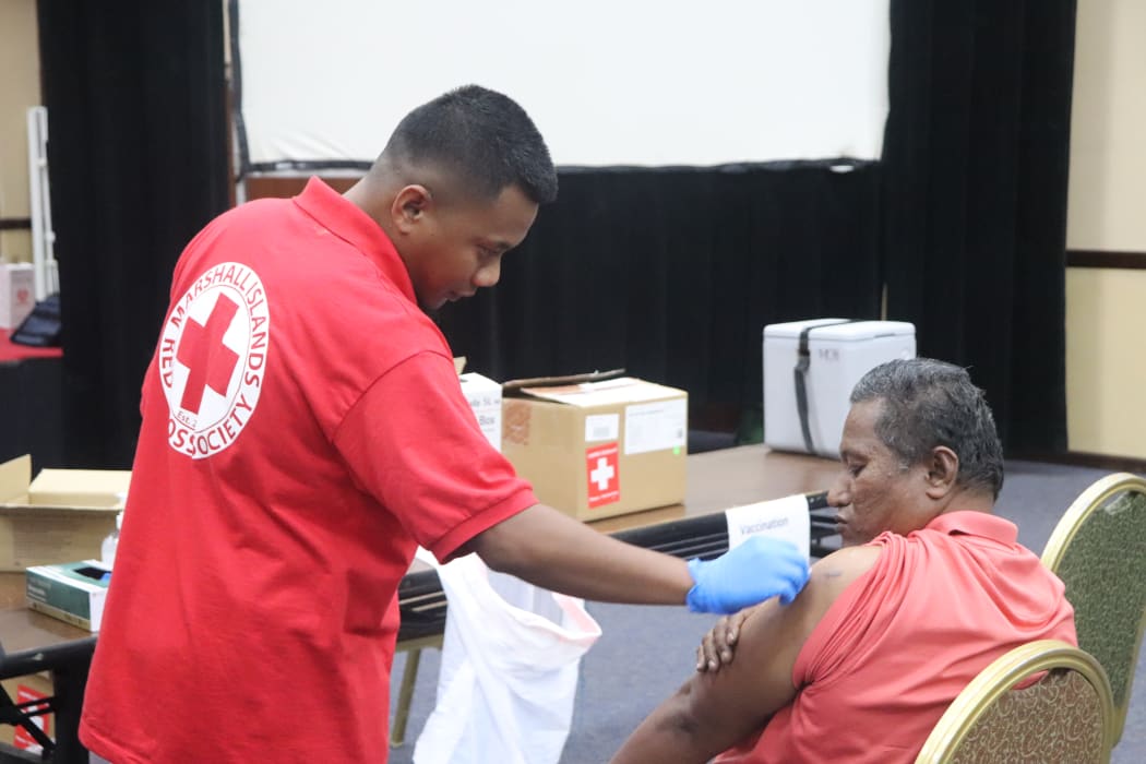 Marshall Islands Red Cross administering Moderna vaccine